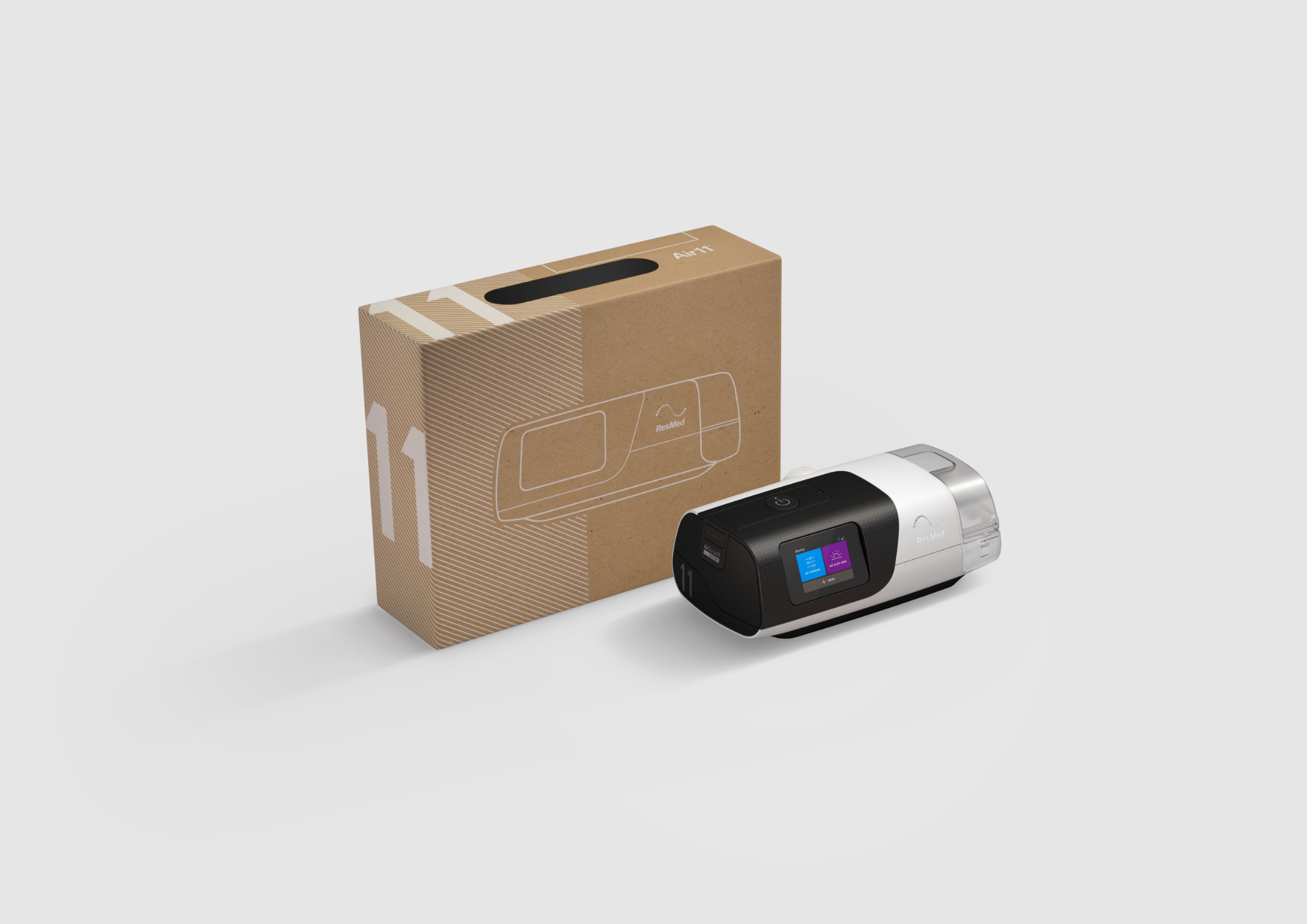 AirSense 11 ResMed junto à caixa Air11, exibindo tela e reservatório